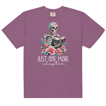 The just one more chapter t-shirt has a design of a skeleton reading a book. A funny joke amongst book lovers. Because we cannot put down a good book.
The colour of the t-shirt is berry.