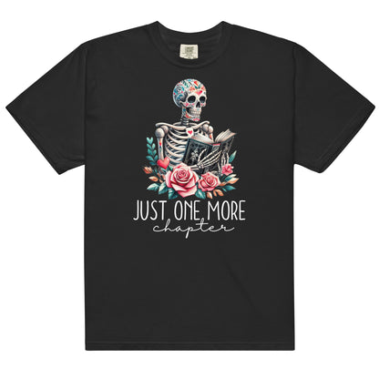 The just one more chapter t-shirt has a design of a skeleton reading a book. A funny joke amongst book lovers. Because we cannot put down a good book.
The colour of the t-shirt is black.