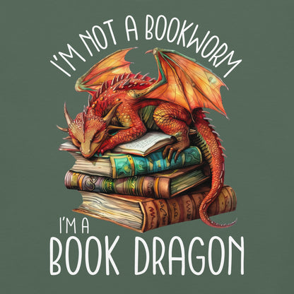 The book dragon t-shirt has a design of a sleeping dragon on top of stacked books. The text says, "I'm not a bookworm. I'm a book dragon."
This is a close up of the design