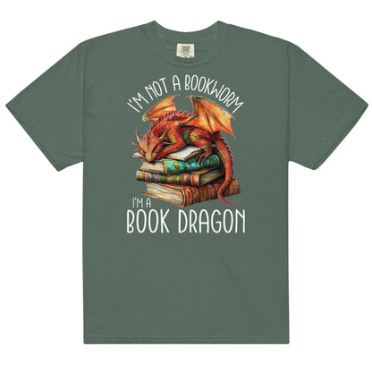 The book dragon t-shirt has a design of a sleeping dragon on top of stacked books. The text says, "I'm not a bookworm. I'm a book dragon."
The colour of this t-shirt is blue spruce.