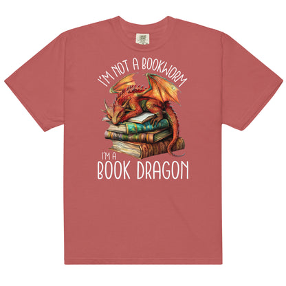 The book dragon t-shirt has a design of a sleeping dragon on top of stacked books. The text says, "I'm not a bookworm. I'm a book dragon."
The colour of this t-shirt is crimson.