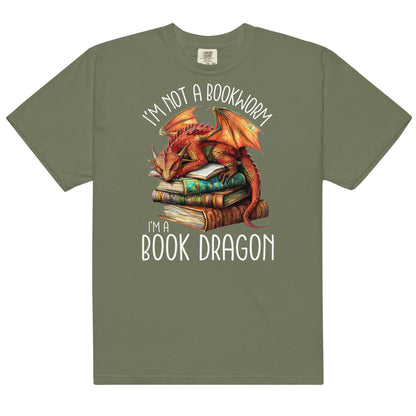 The book dragon t-shirt has a design of a sleeping dragon on top of stacked books. The text says, "I'm not a bookworm. I'm a book dragon."
The colour of this t-shirt is moss.