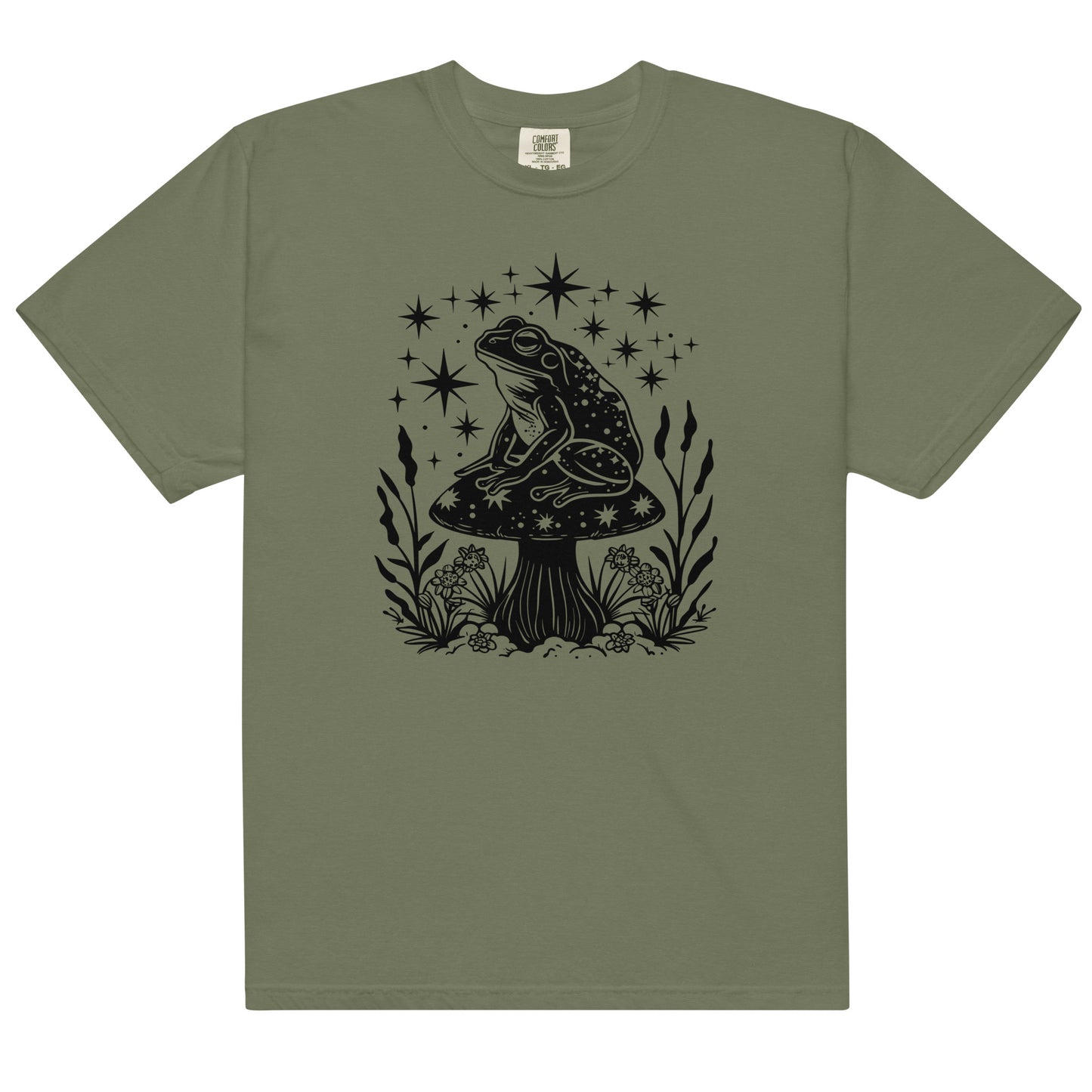 The celestial mushroom and frog t-shirt has a design of a frog sitting on a mushroom that's covered in celestial stars. 
The colour of this t-shirt is moss.