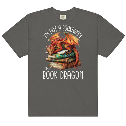 The book dragon t-shirt has a design of a sleeping dragon on top of stacked books. The text says, "I'm not a bookworm. I'm a book dragon."
The colour of this t-shirt is pepper.