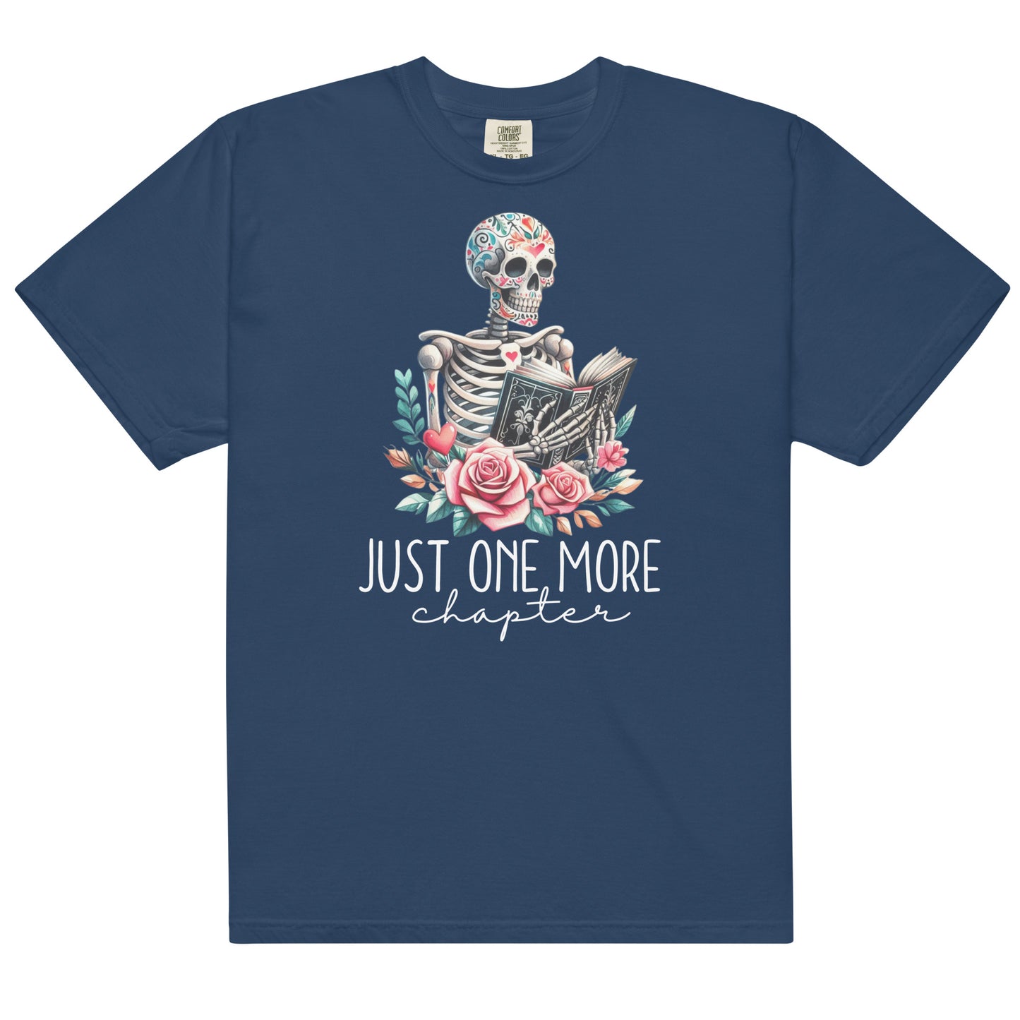 The just one more chapter t-shirt has a design of a skeleton reading a book. A funny joke amongst book lovers. Because we cannot put down a good book.
The colour of the t-shirt is true navy.